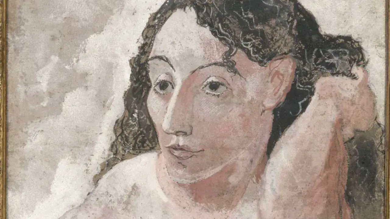 Retrato de mujer con cabello rizado oscuro, característico de la etapa rosa de Picasso.