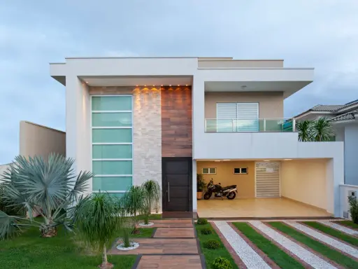 Una casa moderna con líneas limpias y materiales mixtos, que muestra la diversidad de los tipos de casas del mundo.