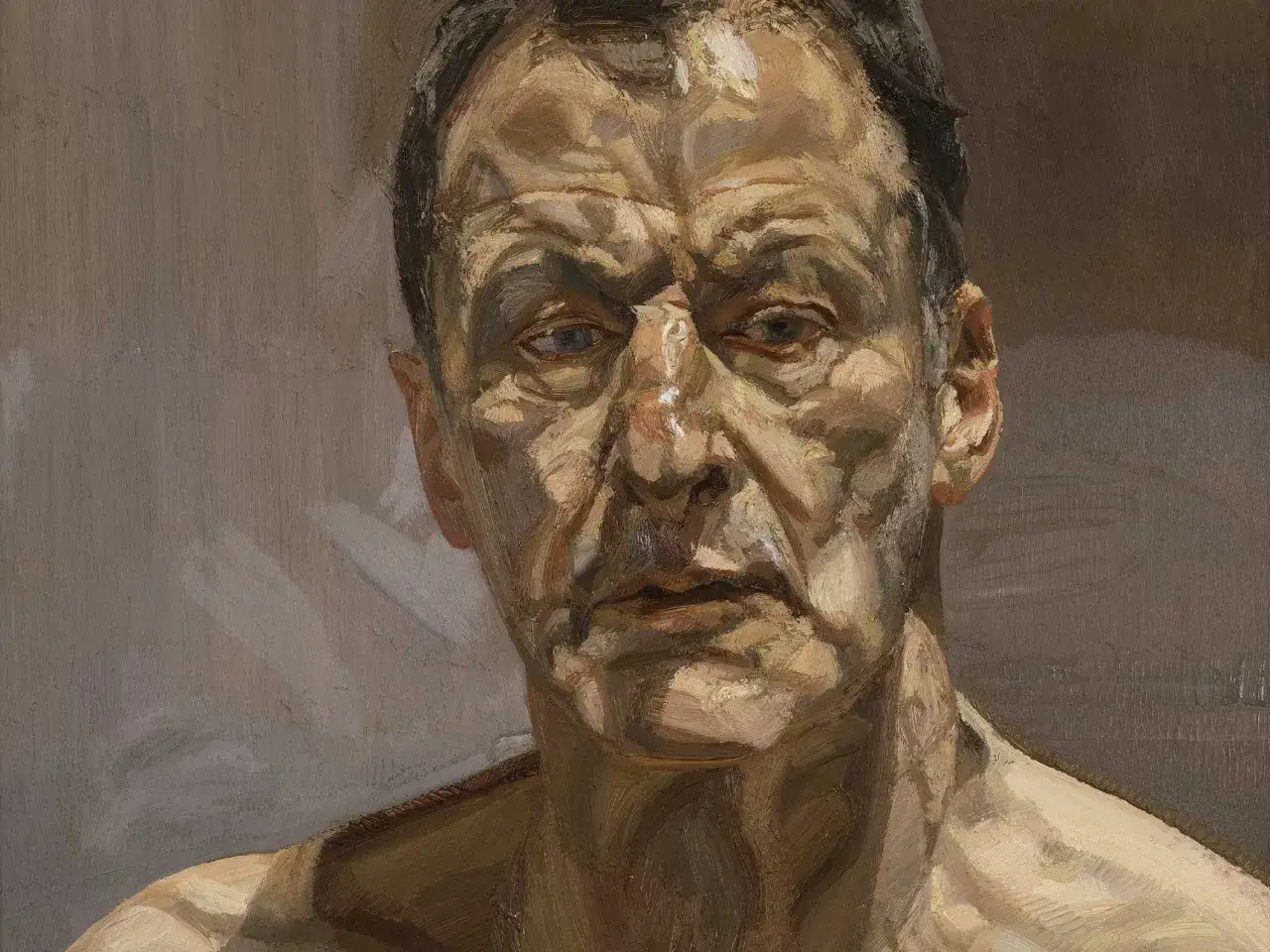 Retrato de un hombre con piel curtida, capturado con la intensidad caracter&iacute;stica de Lucian Freud.
